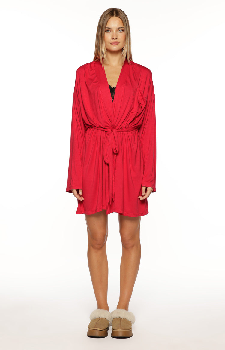 Front view of a burgundy mini robe with long sleeves, a V-neck, and a tie waist