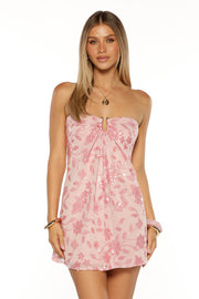 Front view of a pink sequin strapless mini dress with a central O-ring detail, ruched bust, and floral pattern