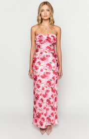 Twisted and gathered bust detail on a pink floral strapless maxi dress