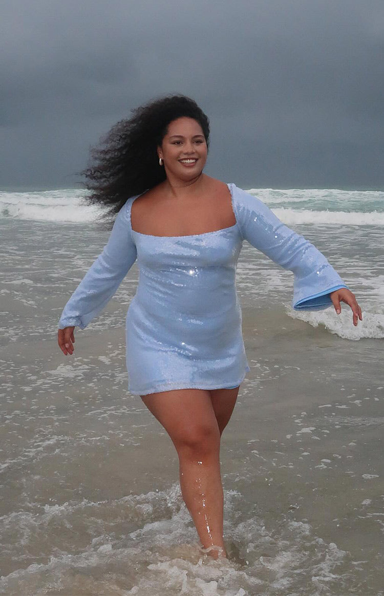 Light blue sequin mini dress with a square neckline and long flared bell sleeves