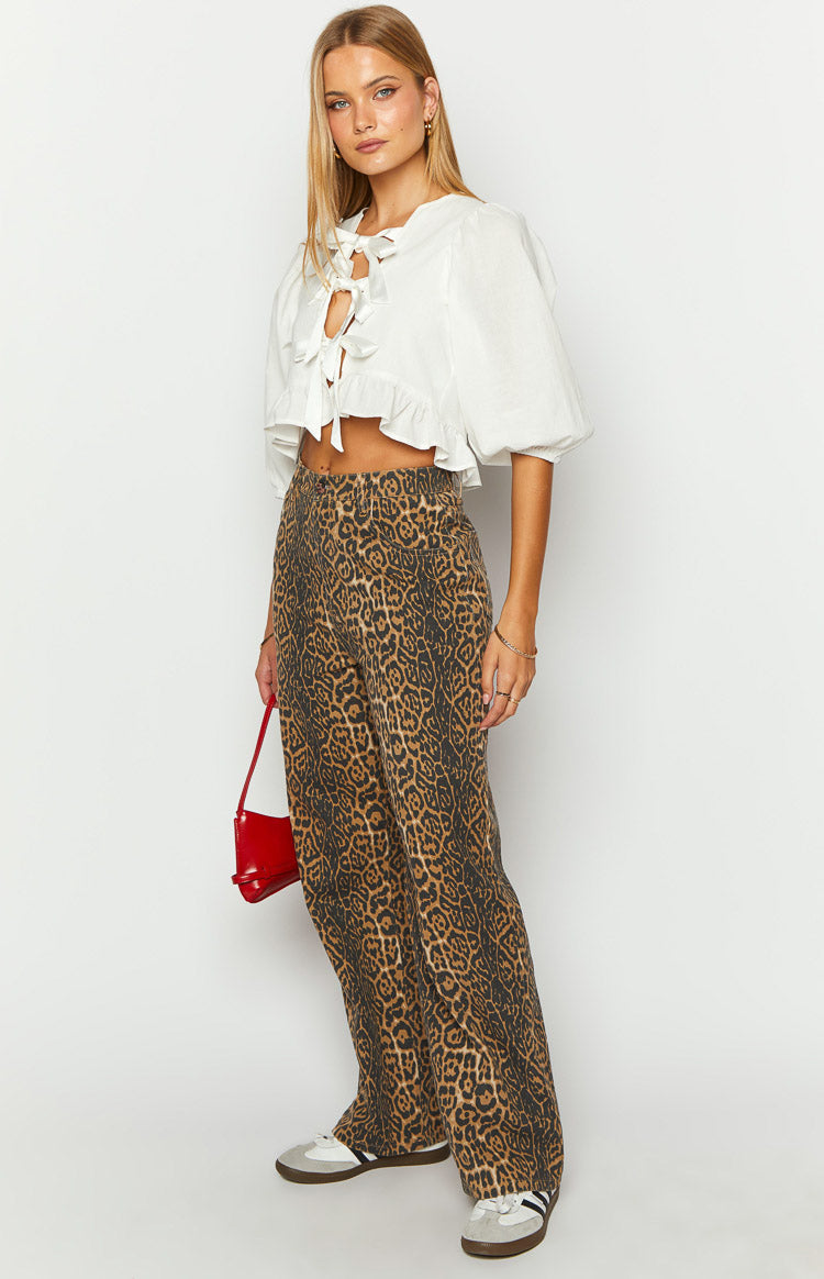 Full length brunet leopard print straight leg jeans with a relaxed fit