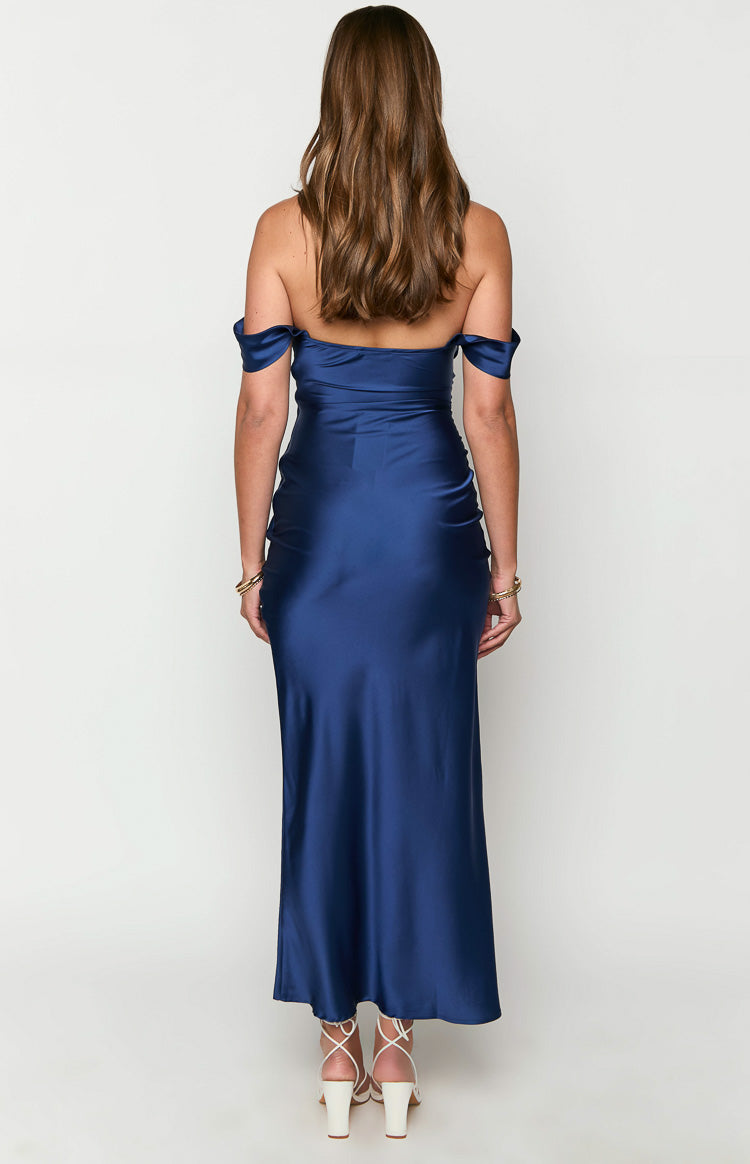 Rear view of a navy off-shoulder formal maxi dress with a smooth satin finish and fitted silhouette