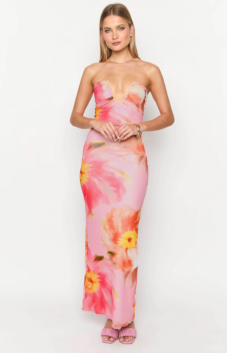 Fitted pink maxi skirt with large abstract orange and pink floral print