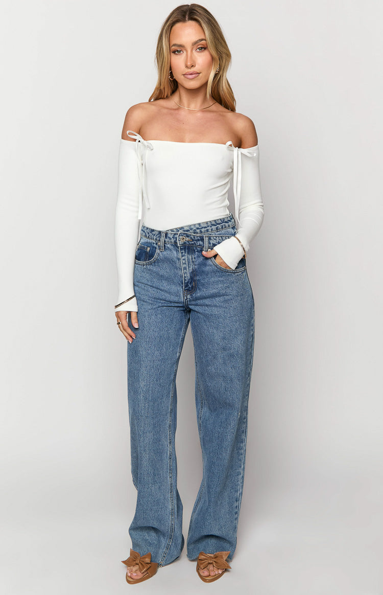 White ribbed off-the-shoulder bodysuit with long sleeves and delicate shoulder ties