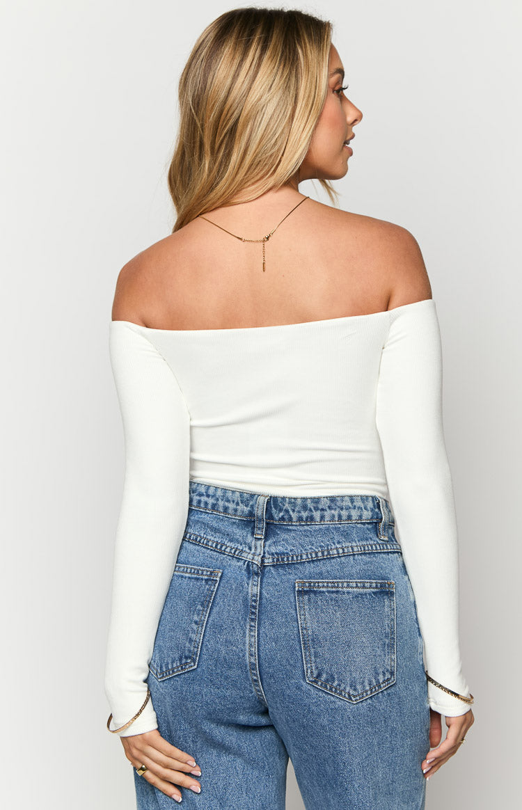 Rear view of a white ribbed off-the-shoulder bodysuit with long sleeves