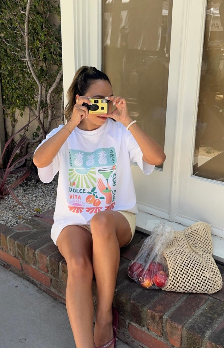 Beginning Boutique Jaz Dolce Vita Print Tee white oversized crew neck tee with a colourful fruit and cocktail graphic print