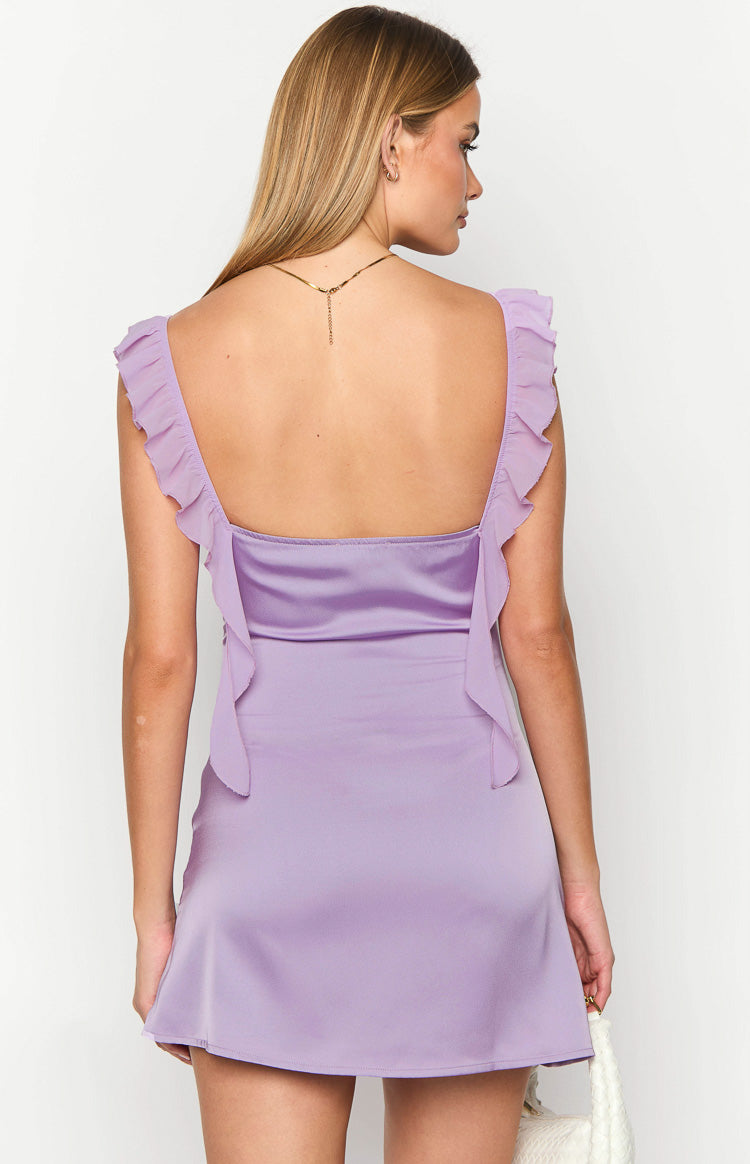 Rear view of a lilac satin mini dress showing the square back and ruffled shoulder straps