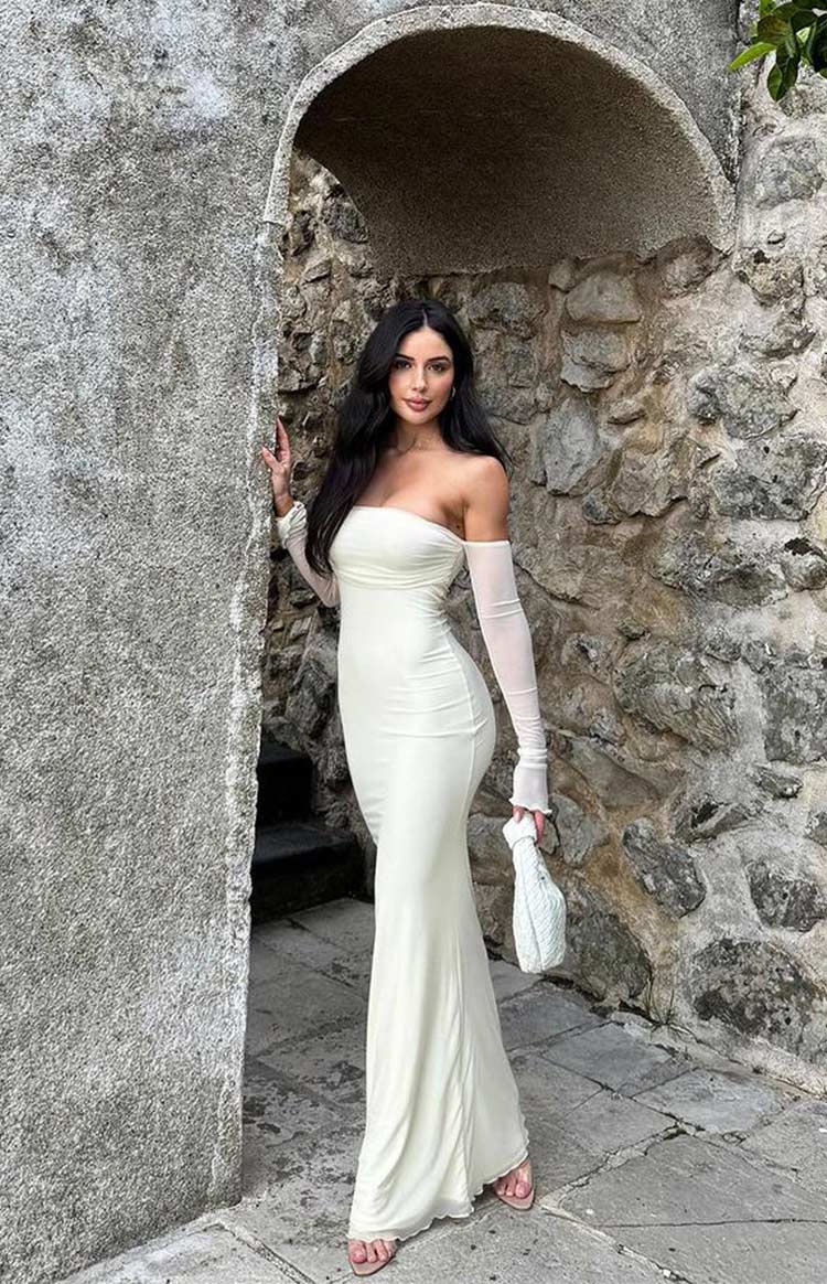 Cream strapless bodycon maxi dress with separate sheer long sleeves and ruffled cuffs