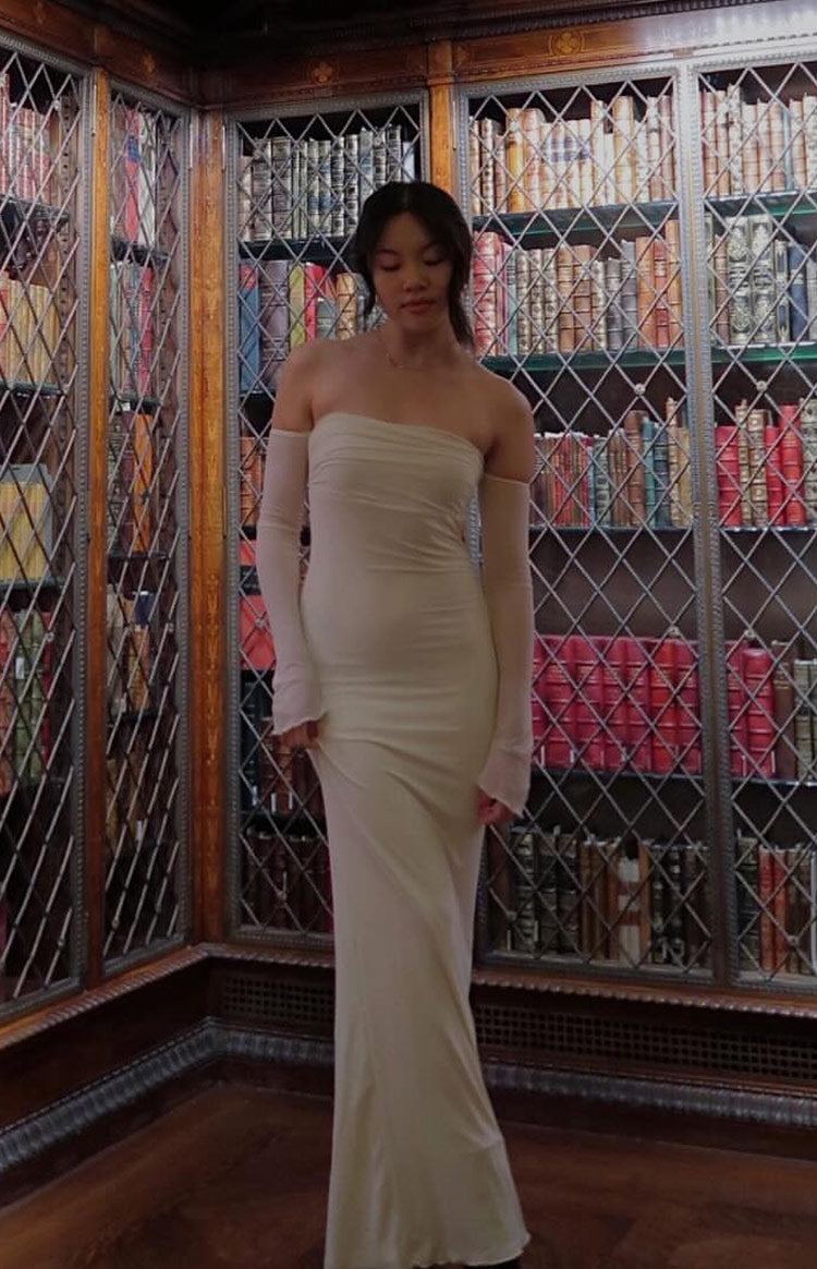 Cream strapless maxi dress with a ruched bodice and separate long off-shoulder sleeves