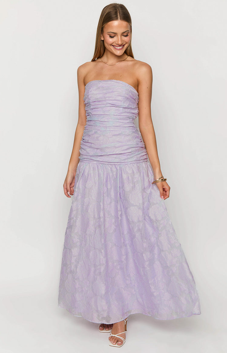 Lilac strapless maxi dress with a ruched bodice and a textured floral pattern on the flowing skirt