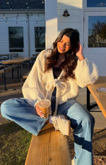 Cream chunky knit tie-up cardigan with long balloon sleeves and a relaxed fit