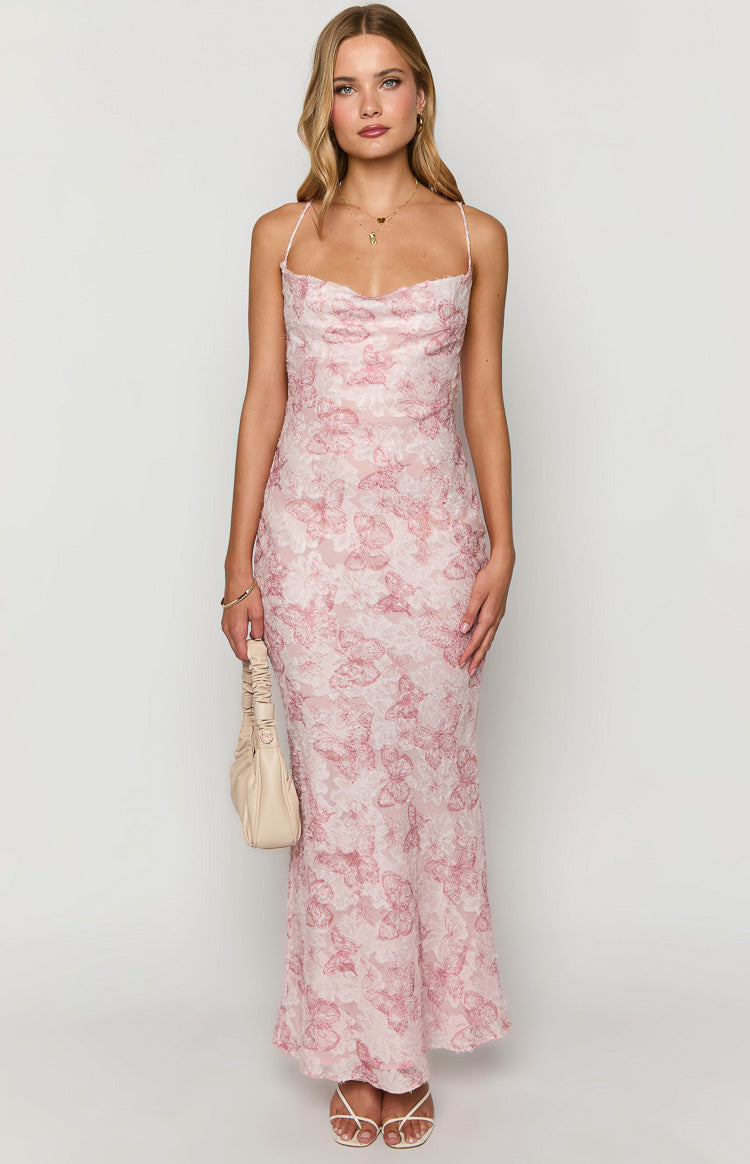 Light pink maxi dress with a draped cowl neckline, delicate straps, and textured butterfly pattern