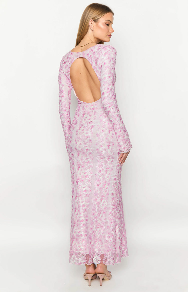 Rear view of a pink floral lace long sleeve maxi dress with a large oval back cutout