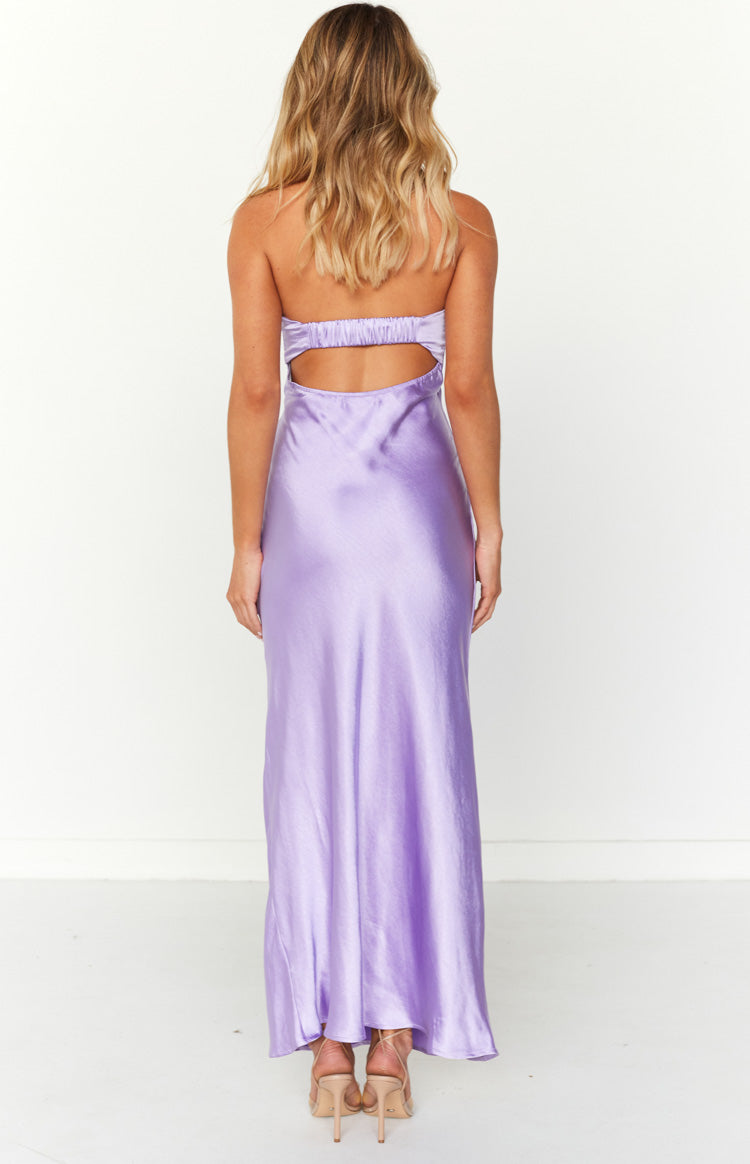 Rear view of a purple satin maxi dress with a shirred elastic back band and cutout detail