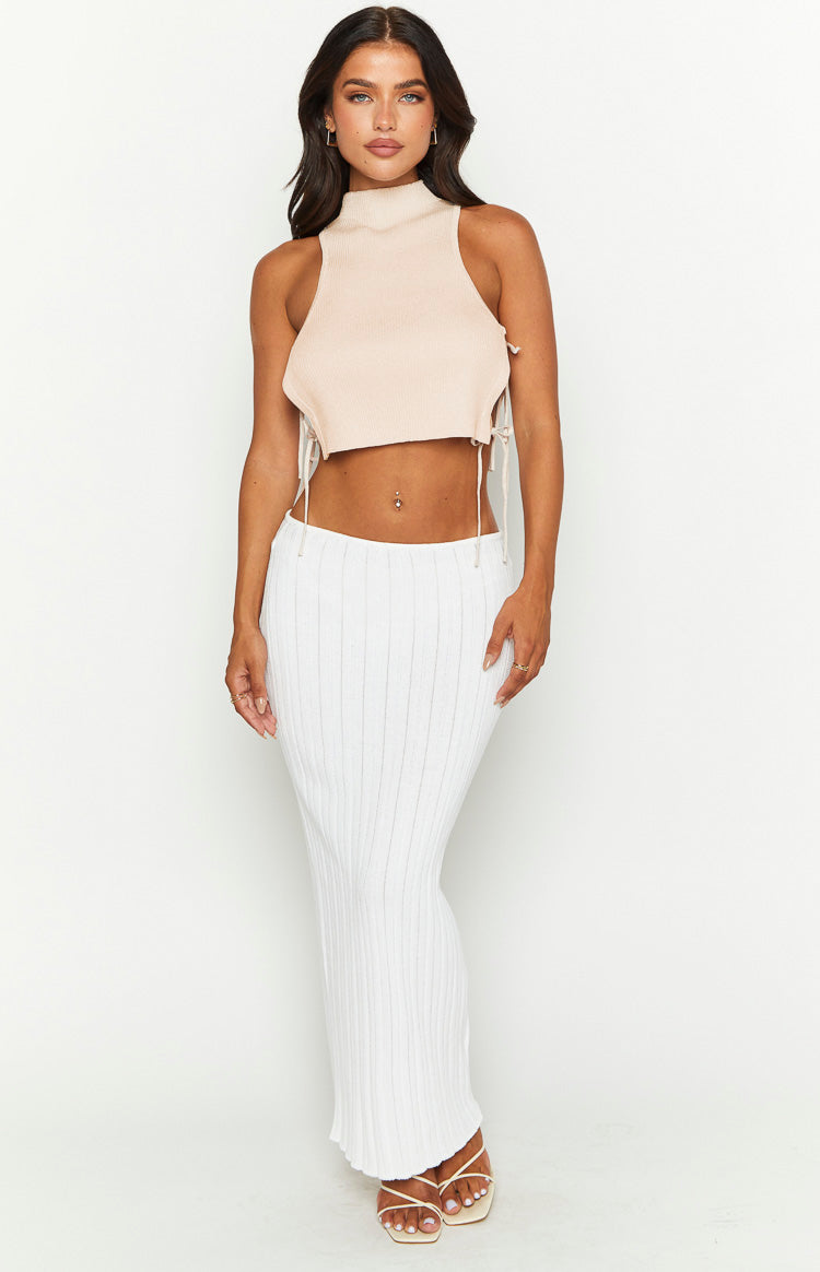 Light pink ribbed knit crop top with a high neck and adjustable side ruching with ties