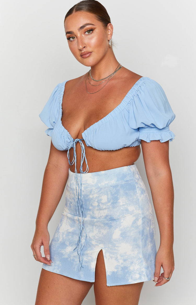 Light blue and white tie-dye denim mini skirt with a high waist and front thigh split