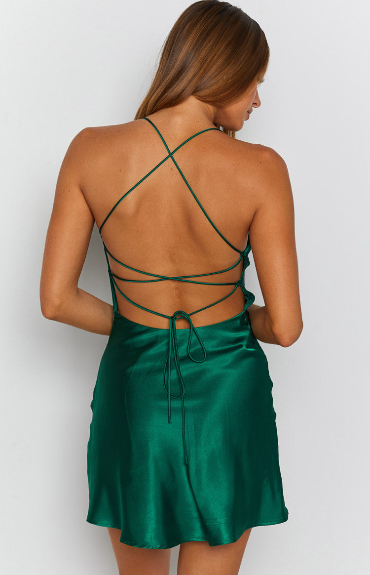 Emerald satin mini dress with a low draped cowl back, criss-cross spaghetti straps, and tie closure
