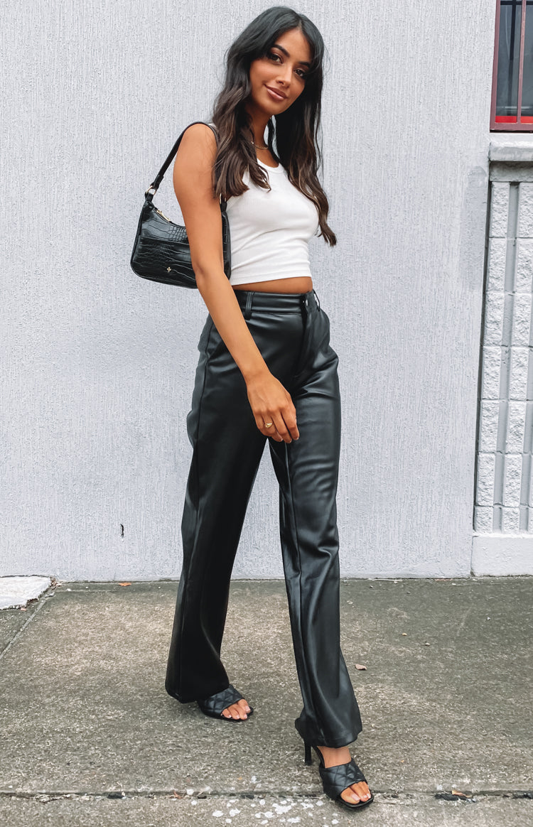 Black high-waisted PU pants with a straight leg and relaxed fit