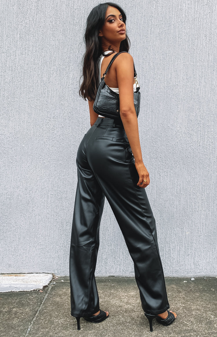 Black high-waisted PU wide leg pants with tailored back pockets