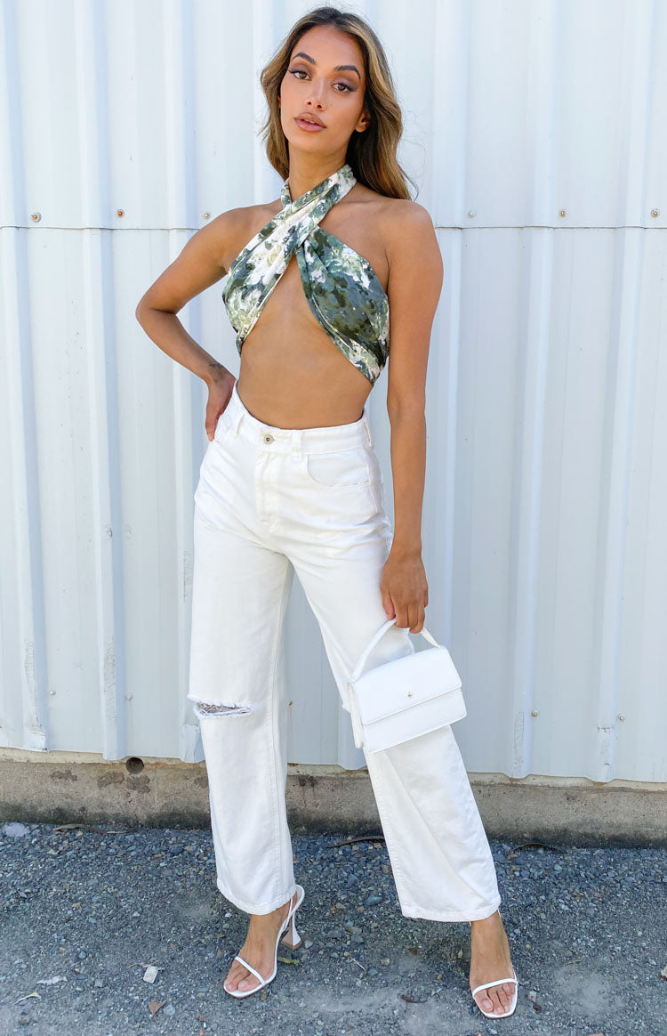 Green and white abstract print scarf top with a criss-cross halter neckline and cropped fit