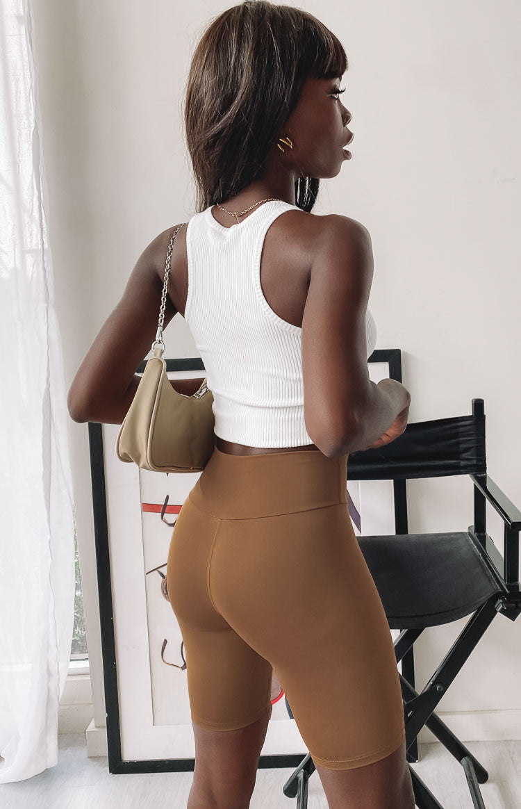 Toffee high-waisted bike shorts with a smooth, bodycon fit and mid-thigh length
