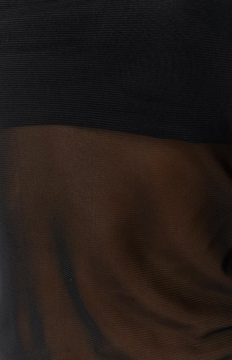 Close-up of the sheer black mesh fabric with a solid black band detail on the bandeau top