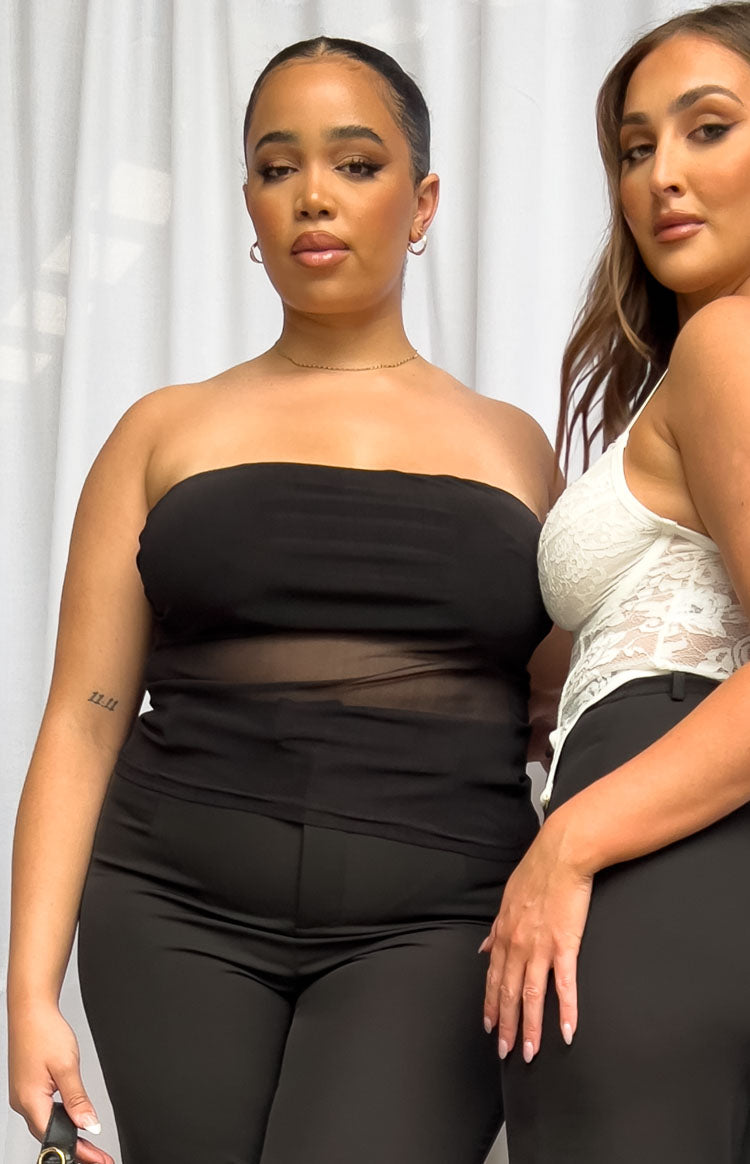 Black mesh bandeau top with a strapless neckline and a sheer panel across the midriff