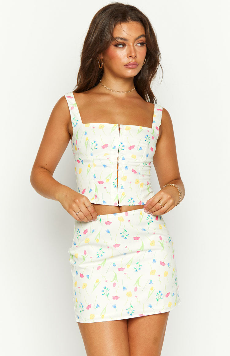 Beginning Boutique Kierra White Floral Mini Skirt white fitted mini skirt with colourful floral print