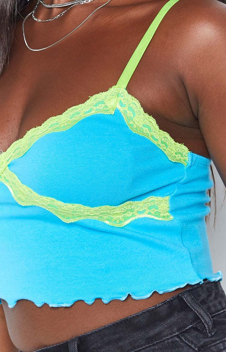 Bright blue ribbed knit tank top with neon green lace trim and thin straps, plus a scalloped hem