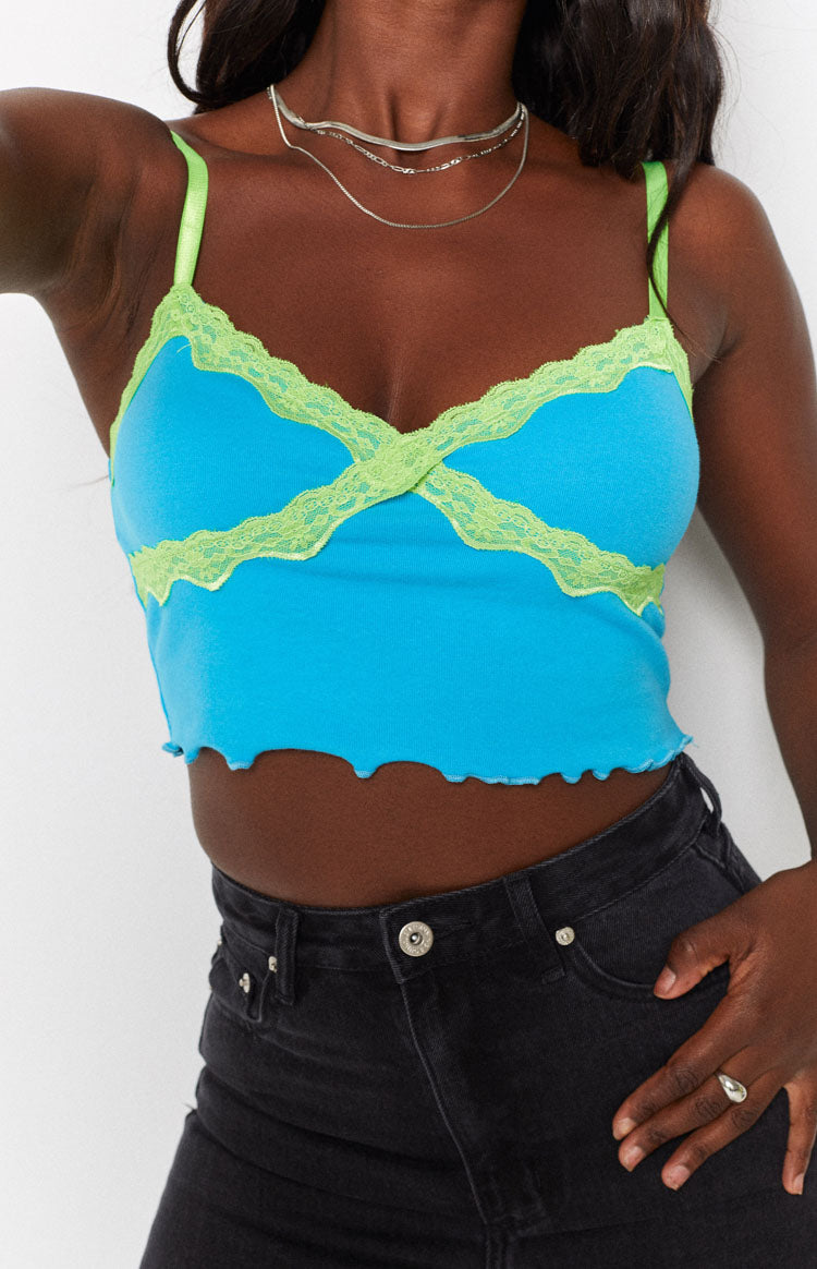 Blue Octavia Lace Spliced Tank Top with neon green lace trim, criss-cross bust, and lettuce hem