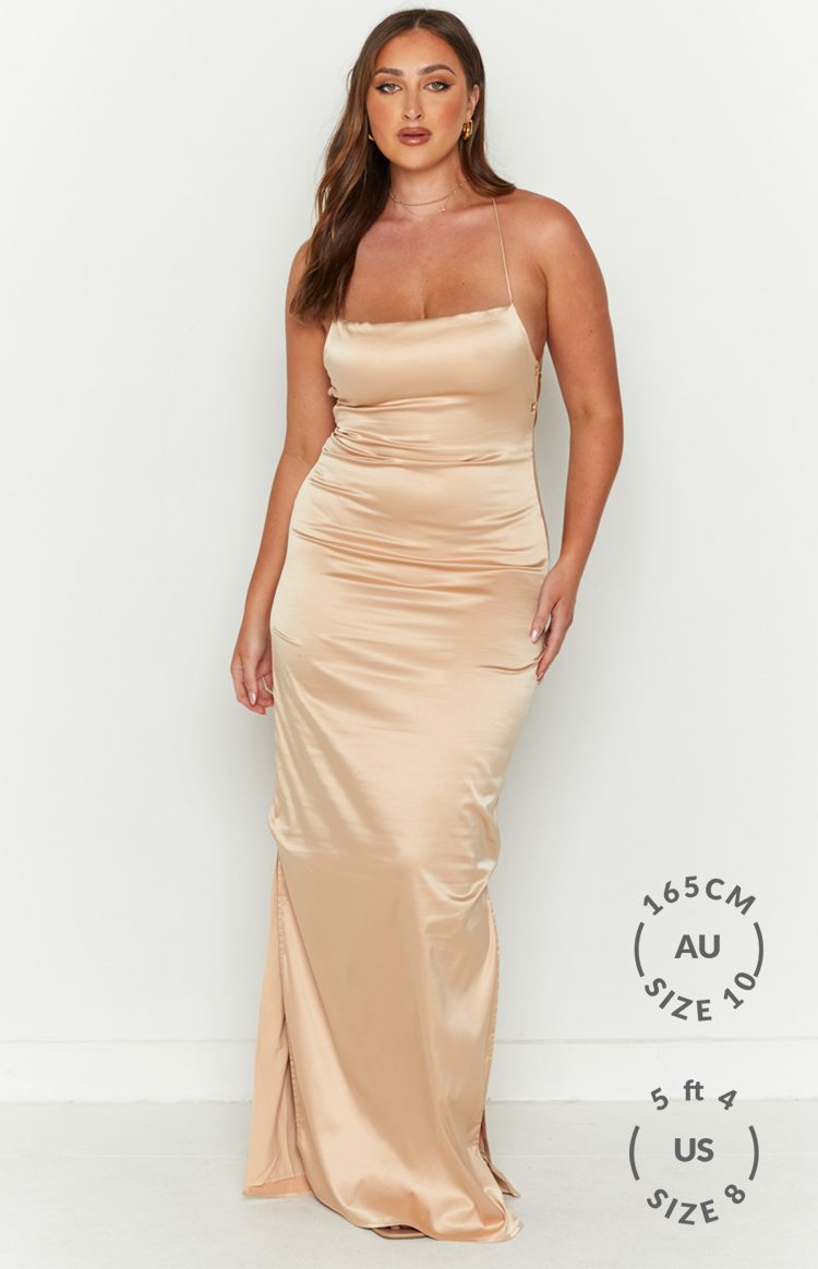 Champagne satin maxi dress with a square neckline, delicate spaghetti straps, and a side slit