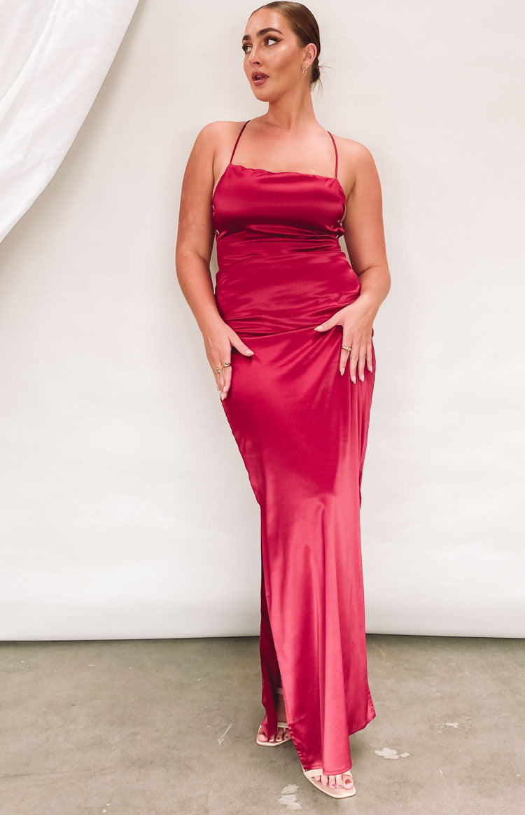 Wine satin slip dress with a straight neckline, thin spaghetti straps, and a high side slit
