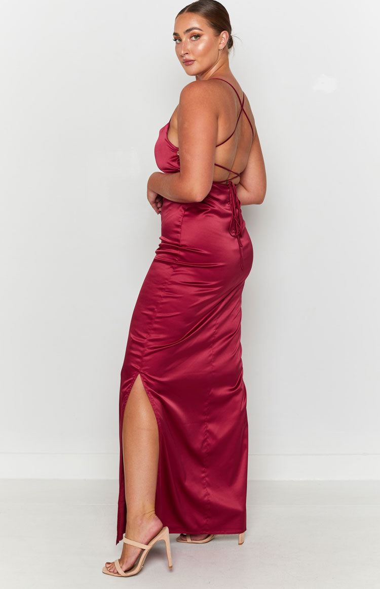 Wine satin formal maxi dress with thin criss-cross back straps and a ruched side split