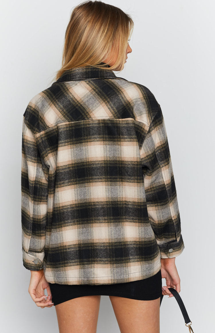 Soft black, beige, and grey plaid fleece jacket with a relaxed fit, back yoke, and buttoned cuffs