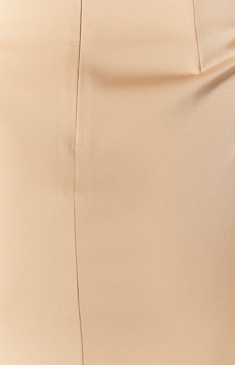 Smooth gold fabric with a central vertical seam