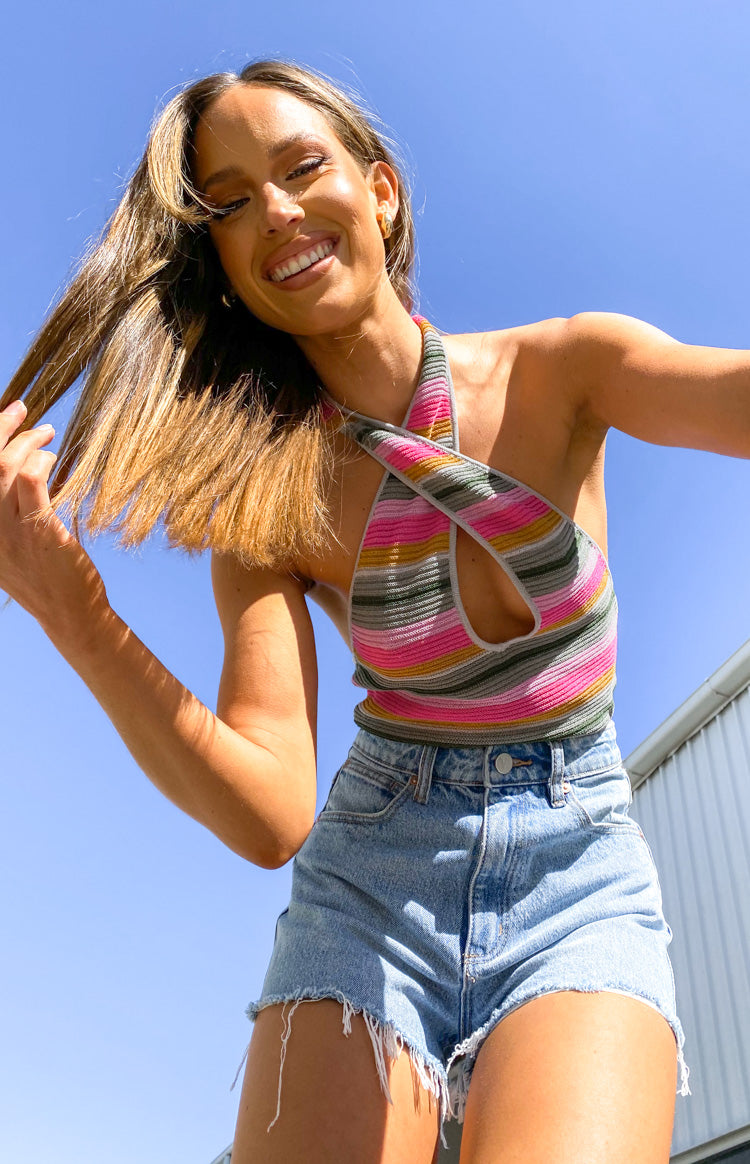Close-up of the multi-coloured striped knit halter top with criss-cross neckline and keyhole cutout