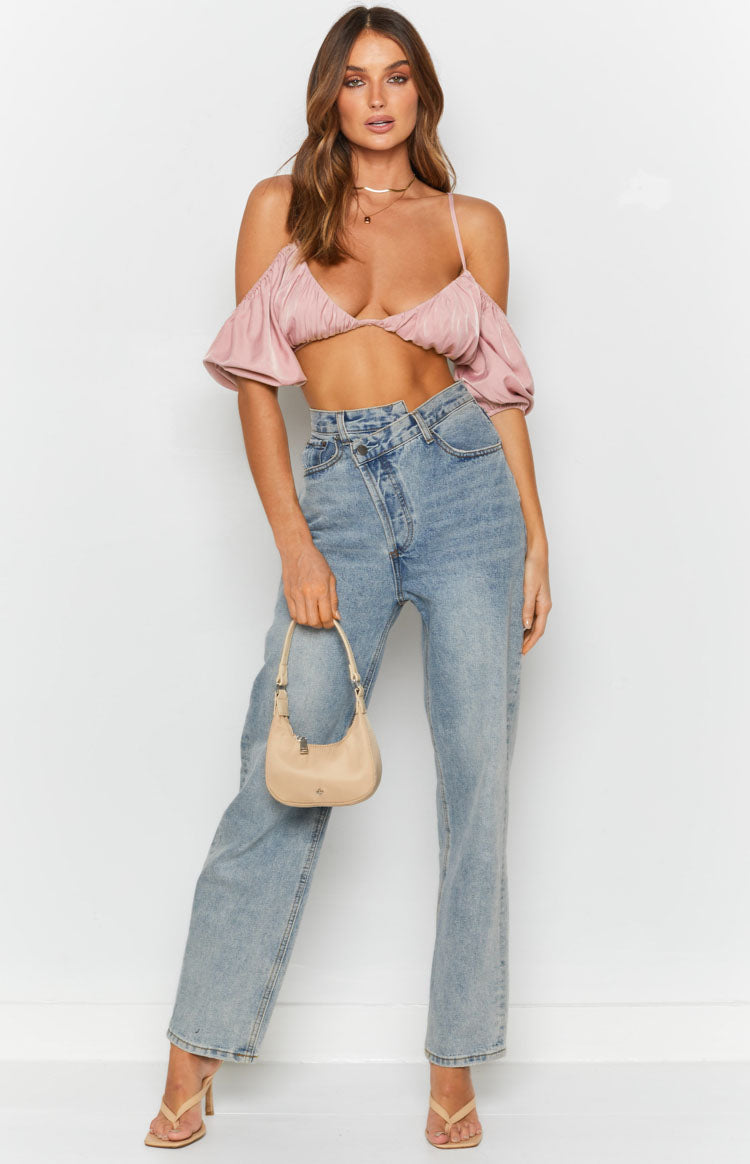 Pink off-shoulder cropped top with gathered bust, thin spaghetti straps, and short puff sleeves