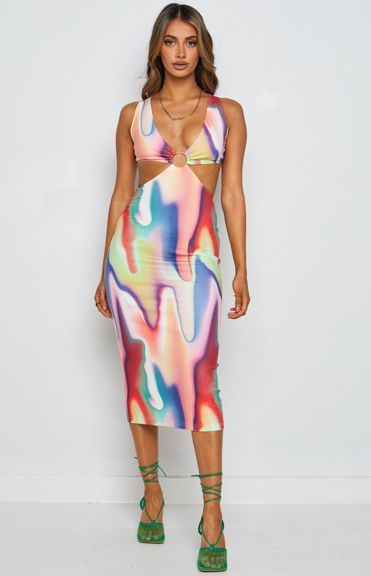Front view of a multi-coloured abstract swirl print midi dress with a deep V-neck and waist cutouts connected by a gold O-ring