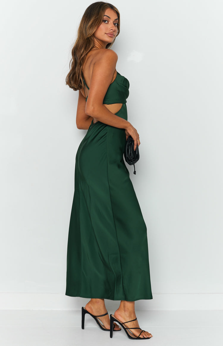 Dark green satin maxi dress with side cutouts, a strappy back, and a flowing skirt