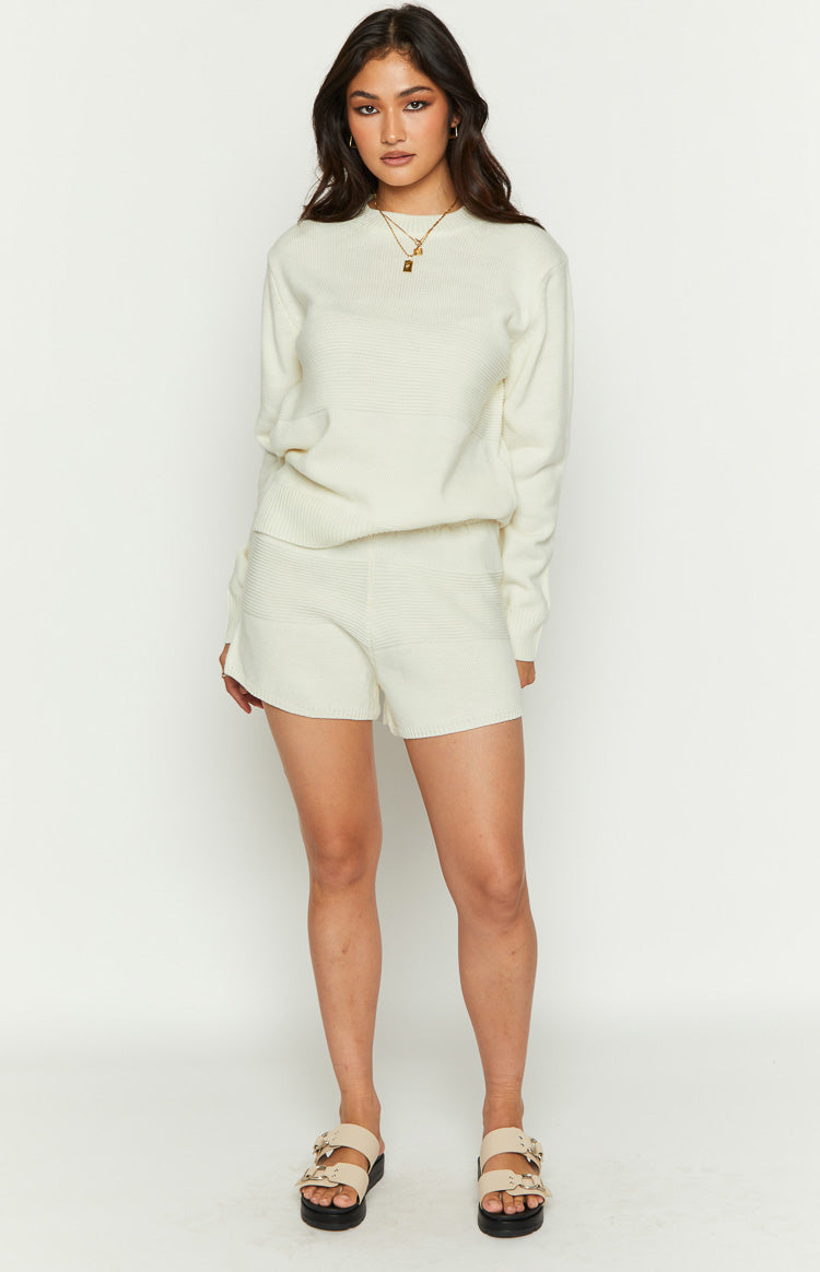 Beginning Boutique Winslee Long Sleeve Knit Top off-white ribbed knit long sleeve top with crew neck and horizontal textured panels