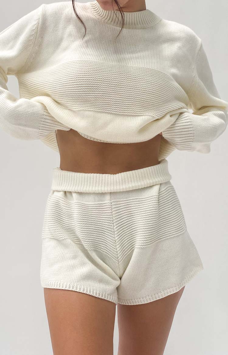 Beginning Boutique Winslee White Knit Shorts white knit mini shorts with ribbed waistband and horizontal knit patterns