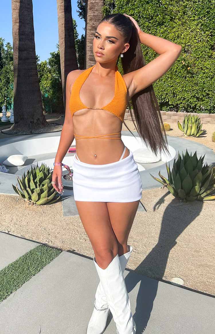 Beginning Boutique Elva White Knit Mini Skirt white low-rise fitted knit mini skirt