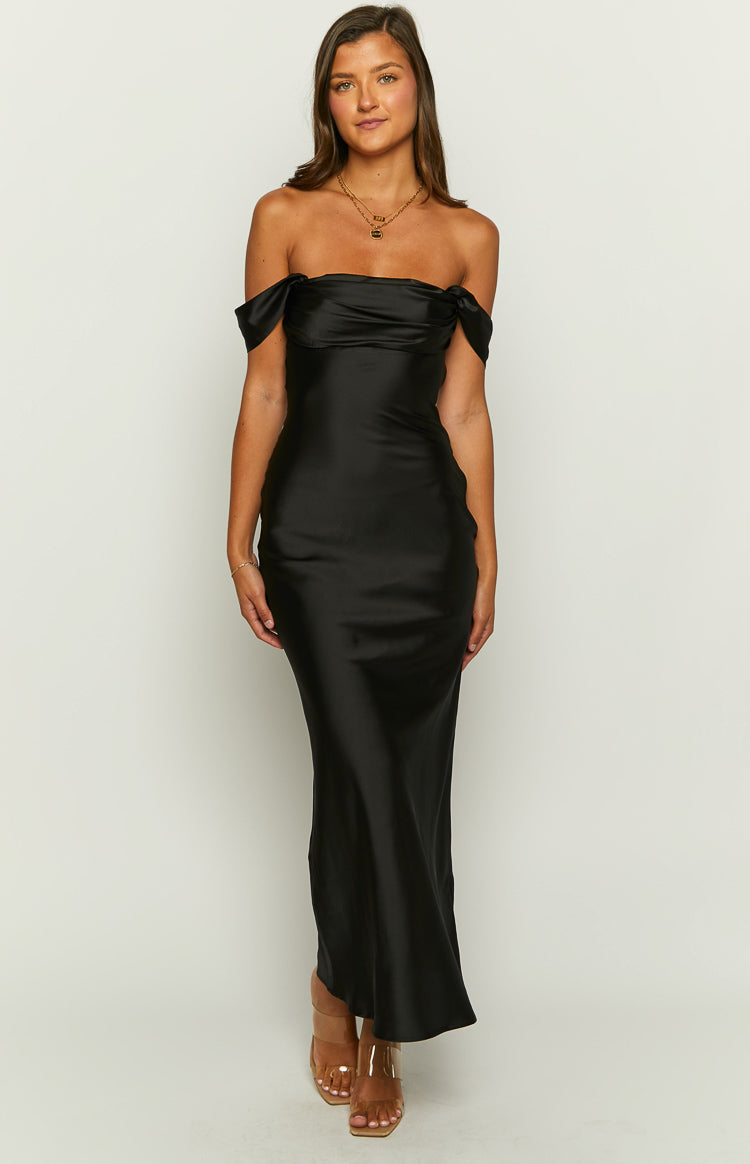 Black off-shoulder maxi dress with a draped neckline and a fitted satin bodice